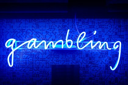 blue gambling neon signage